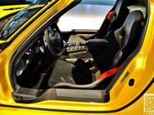 I no its not a GT3 and it's not the same yellow, but it gives an idea of what red stitching/belts look like on a yellow car.