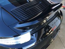 The 991.1 gts grill is missing a slat for the brake light. 