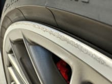 Slight curb rash on rear driver wheel.