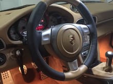 New, thicker two-tone sport steering wheel