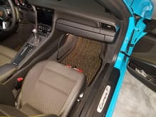 Took photo of mats but shows what you were asking about Trim piece above glove box door and Inner piece at periphery of console.