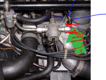 Please see Temp II sensor(blue arrows) behind the temperature sensor(red/green arrows). I"m having trouble getting at it with a wrench/socket. I believe its a 19mm nut