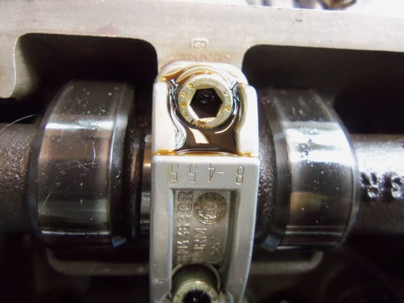 Example of cam bearing cap numbering. Note the -8 after the 455, and the 8 stamped into the sealing rail of the head.