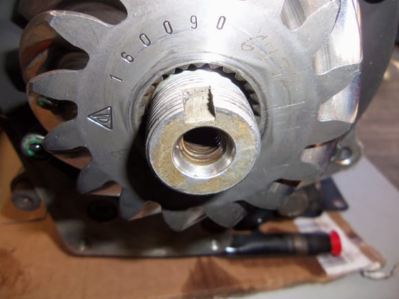 Nut removed, note the stamped and engraved markings on the pinion gear.