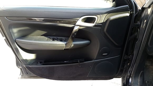 Still showing black door handle pulls. CF ones are installed now. Will take pictures later.