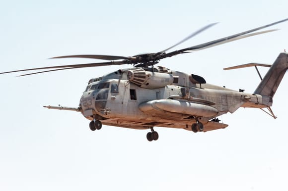 Well since you gentlemen want to make me more jealous than I already am...here is a picture of my ride! An extremely dirty CH-53E Super Stallion! I really want the GTS 408hp engine, but until then I will be ok with my 3x 4,500hp engines.