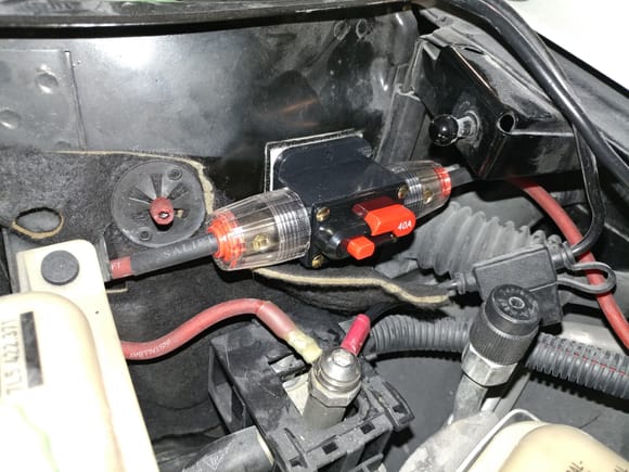 Here's the Driver's side install.  Wire tap from 12v + horn wire goes to relay trigger input - one output from the relay feeds each horn unit.  The passenger side is essentially the same but with the other horn unit and no relay on that side.