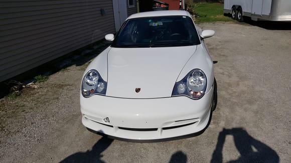 This 2004 Porsche 911 GT3 is finished in White over Black full leather and shows just 32,922 miles. It is equipped with a Mezger 3.6-liter flat-six and a 6-speed manual transmission, both of which have been maintained in stock condition. The car was delivered new in New Hampshire and carried an MSRP of $102,600. Options include Xenon headlamps package, the center console painted white, Black seat belts, and more. 
