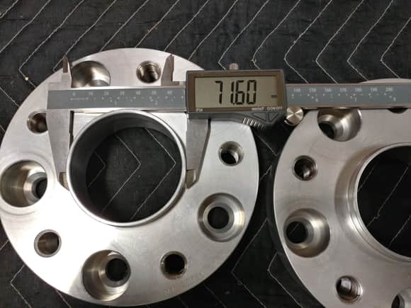 hub-centric flange for the wheel needs to be EXACTLY 71.6mm or you'll get high speed vibrations.  Do not buy spacers that do not have the hubcentric flange no matter how thin the spacer is.