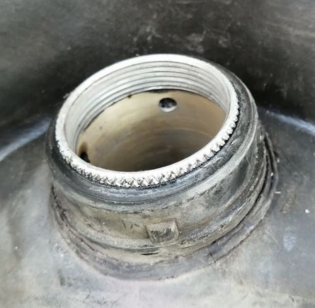 Nozzle insert pulled out slightly showing casting flashes etc.