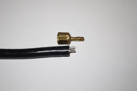 An aftermarket cable that was given to me for repair. It is apparent that the ignition wire was cut too short; it hardly extends into the M3 terminal. The M3 terminal is hardly crimped as well.