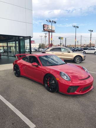 Carmine looks amazing. Glad I choose this beautiful color. Despite what others say, I think this car needs a bypass exhaust. But perhaps I’m just used to my RS being loud on the track with one.  Definitely a lot more tire noise on road then prior 991.1 GT3.  Great car! 
