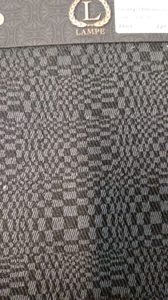 I ran across this fabric in a pile of mattress ticking samples. It is a tiny print but VERY similar. I ordered a sample roll of it so I could make a suit some day,lol