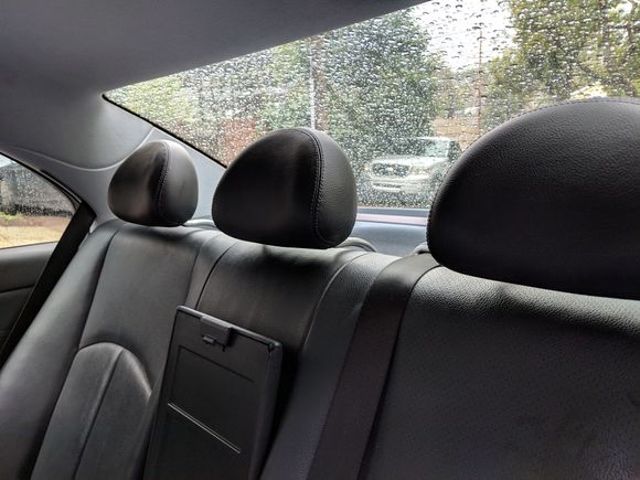 Headrests for passengers can be dropped electronically from the driver dash