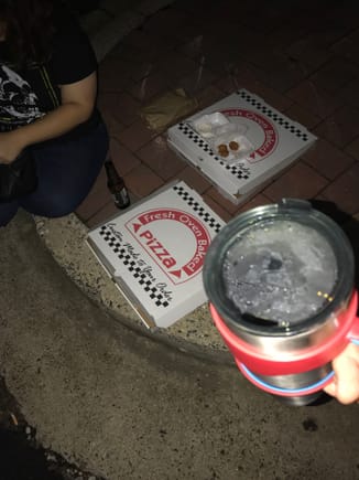 Drinking and ordering pizzas in the hotel parking lot. No, we did not steal it...