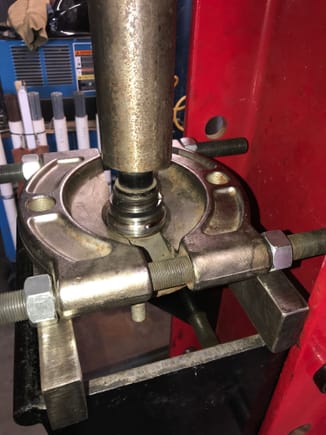 Large bearing separator to get a bite on the inner race of the bearing on the stub shaft of the flange hub.  NOTE:  this is the same bearing separator I used to support the carriers while pressing out the flange hubs. I was a dumba$$ and forgot to get photos of that.