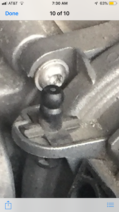 Do I unscrew the 4 bolts, and what is this lil black knob?