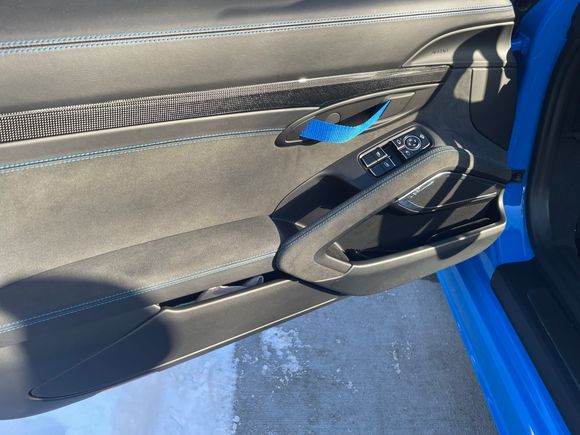 DIY door handles/straps to match the Shark Blue seat belts.  Easy DIY videos available on YouTube.  Got these from fellow Rennlister but the product is available from Amazon and easy to duplicate.  PM for details