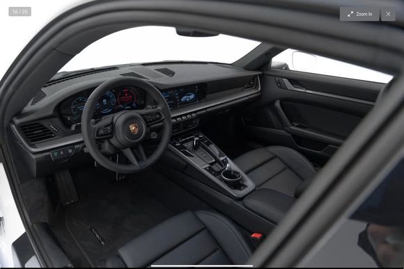 Actual 992.2 example.   Base interior, base wheel, no SC.  Very clean look, easy care. (Many examples like this on European Porsche site).
