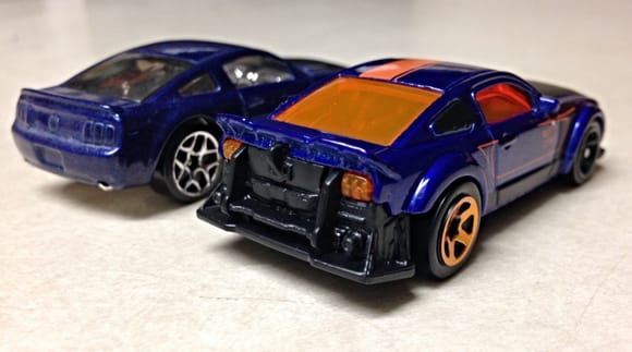 I got this SEMA Mustang today. It may be odd. But, Hotwheels has added some nice casting features like the adjustable front chin spoiler so it can run on the loops and still look cool and normal without a funky looking swept up angle and the fact that the car has headlights and taillights cast in from the window piece.