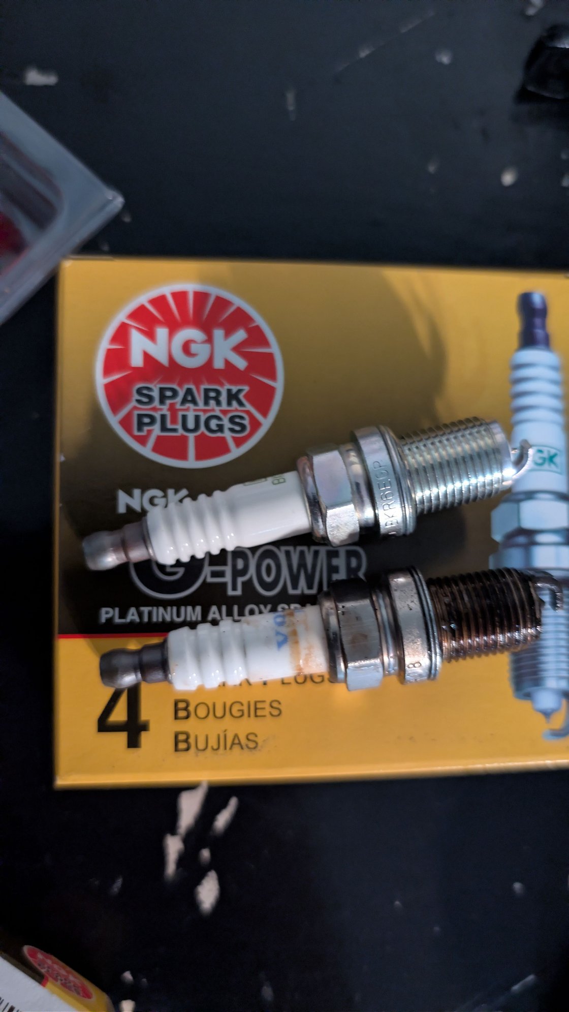 old vs new plugs. they were in ROUGH condition
