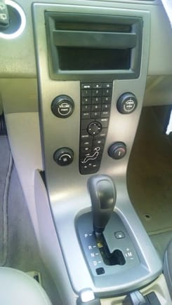 The center console was in pretty good shape, but had to come out so it would match the color of the door handles, and to repair a broken tuning knob, and radio display.