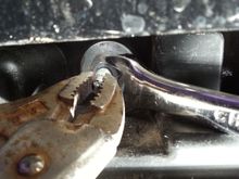 this does not work.  the bolt has a plastic coating like loctite to prevent it from coming loose.  very hard to un-bolt.