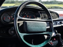 Steering wheel and controls in nice original condition.