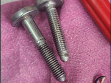 Steel bolt replaced on right side due to fear of the head getting damaged during removal to avoid future issues.