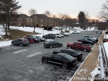 Sparsely-populated lot; more trucks & SUVs than cars.