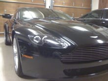 I had a Escort 9500ci installed in my 2009 AM V8 Vantage. The guy did a sweet job, it wasn't cheep. The install cost me $1,500 and took two days. He placed the radar detector behind the front grille, the two laser shifters are perfectly placed between the grill blades and don't stick out past the grille, the GPS tracker is placed under the dash in the center of the car by the windshield. The control unit is placed by the 12V power supply where the ashtray would be so to access it, you just flip up the cover. He routed the software update cable into the center console next to the iPod interface. He placed a fuse for the unit in the little storage space behind the seats, and he will be recessing the rear laser shifter in a powder coated license plate frame at the bottom. The rear laser shifter will be flush mounted with the license plate frame so it doesn't look like an after thought. Best of all he mounted the display next to the rear view mirror on the drivers side. ONLY the driver can see it and you don't have to take your eyes off the road. You can't see if if you were to look into the window (like a cop would when they pull you over). This is truly a James Bond 007 install and it works like a charm. I hope this is helpful.