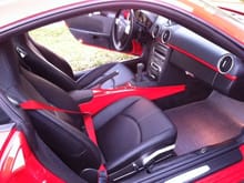 Red console, red belts, console lid with crest, gt3 shift knob, gt3 e-brake, red dash strips installed.