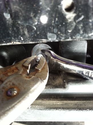 this does not work.  the bolt has a plastic coating like loctite to prevent it from coming loose.  very hard to un-bolt.