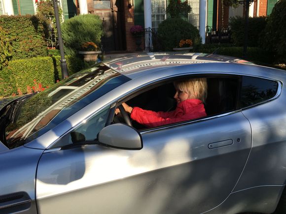 Mila driving the Aston Martin Vantage V8