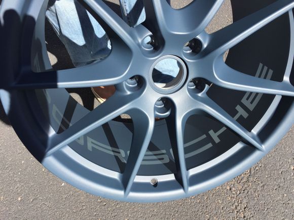 Porsche script on barrel