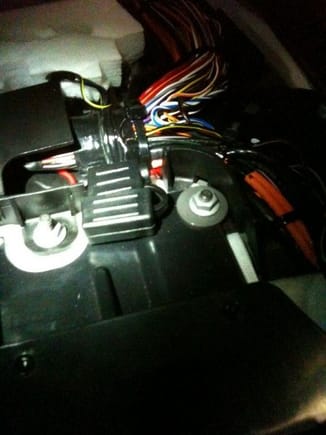 Escort 9500c1 power cord with fuse installed in small compartment behind seats.