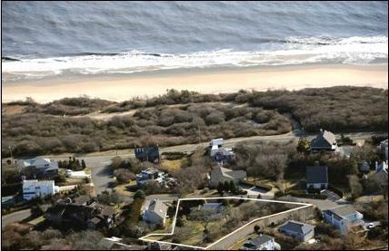 Arial shot of Montauk beach property outlined by white near the lower center of picture.