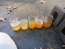 in the end--the left bottle wins.  however now--upon driving with new coolant, again TOTALLY BROWN metallic coolant. 