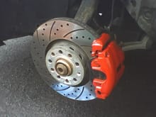 A8 (Powerstop) crossdrilled/slotted rotors and Hawk ceramic street pads on my A4 (hand-painted red calipers, no clear coat)