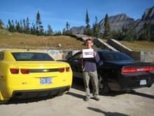 While taking pics of Marmots on a trail at Glacier Nat'l Park in Montana, we came back to our car to find three guys from Texas, also on a road trip, parked next to us in a new Challenger.  One of them graciously posed with the CamaroZ28.com logo.  We then cruised down the mountain on the Going To The Sun Road together, getting a lot of thumbs-up from passers by!