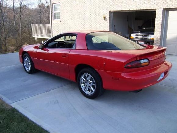 2002 Camaro B4C Special Service Coupe.  One of 18 red, six speed cars - may be a one of one Camaro with the unusual B4C options of chrome wheels and Hurst shifter.  Currently has 12,000 miles on the odometer