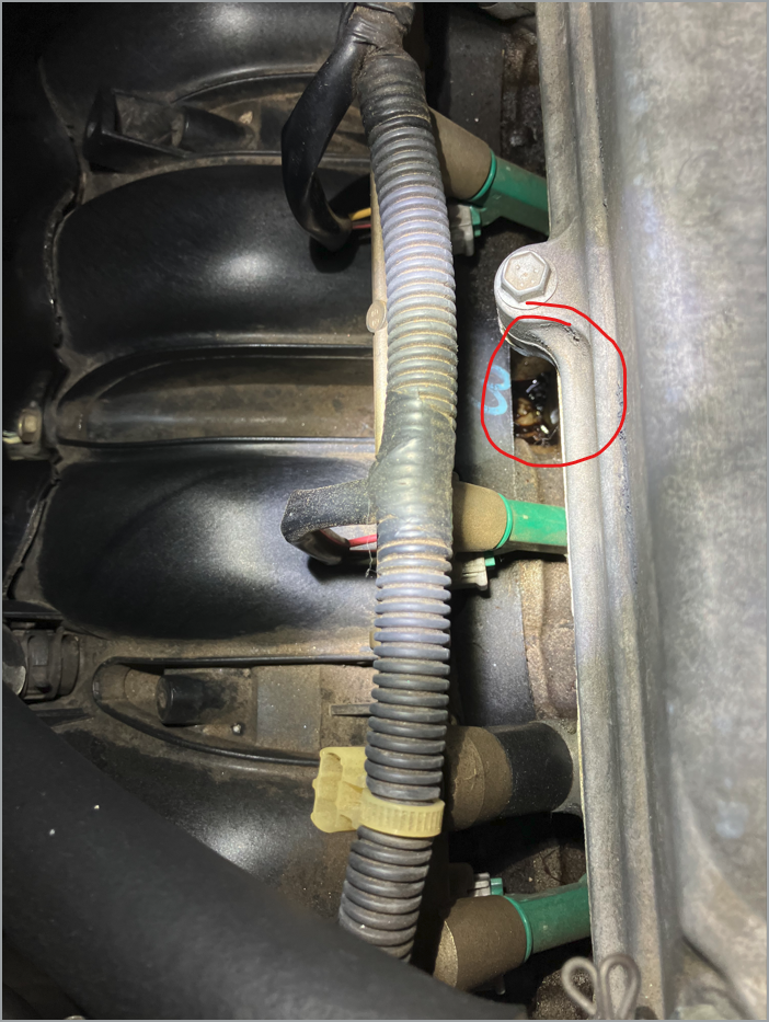 Oil puddle on top of intake manifold on 2004 camry 2.4L