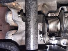 The cable bracket fits right under the fuel rail. I originally though I would have to use a TB spacer to move it above the fuel rail if i wanted to do this but all I will have to is notch the arm just a bit so the butterfly valve can return back to idle.