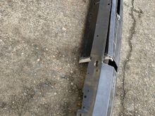 Ended up cutting along the bottom of the angle and mostly flattening out the angle. Left the crease line in so it matched the rest of the bumper.