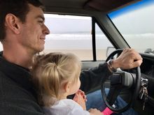 I see your baby driving picture and raise you a baby driving picture.  This was driving on the beach in the OBX.  Before anyone panics, we were doing 10 mph on flat sand for as far as the eye could see.