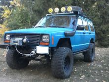 Homemade winch plate from hell. Rock sliders made from old car wash - galvanized steel, homemade grill and custom bumpers :)