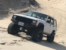 Climbing a dune in OBX.