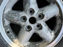 After numerous strippers applied and power washed.