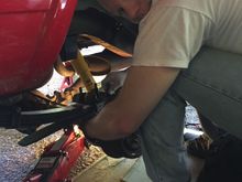 finger tightening the U-bolt nuts.