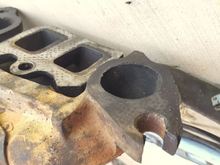 the bottom left you can see where on the exhaust manifold where the exhaust had been leaking through the gasket
